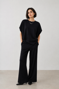 Siyah Asimetrik Kesim Dökümlü Kadın Takım